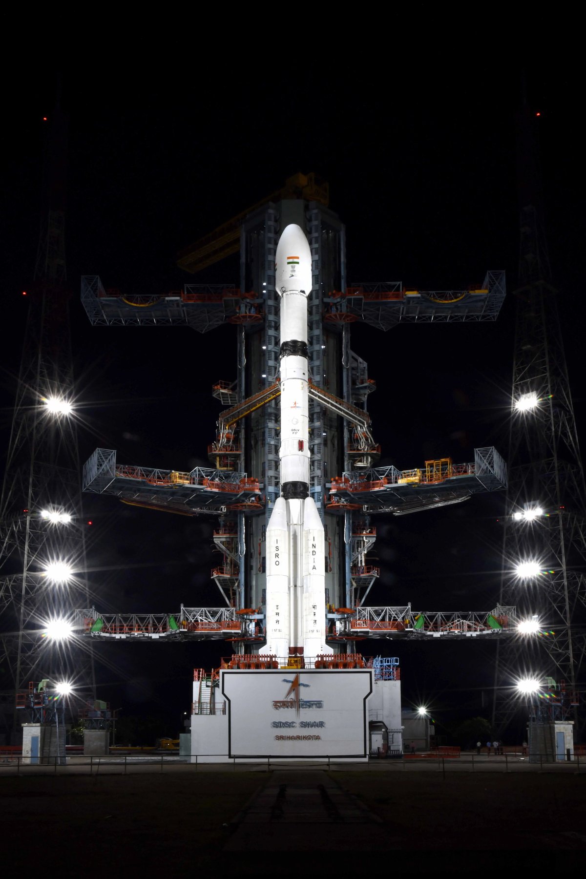 A GSLV rocket lit by floodlights at night on the Second Launch Pad at Sriharikota